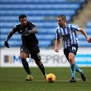 Joe Cole Battles Past Defenders in Coventry City's Sky Bet League One Clash Against Bury