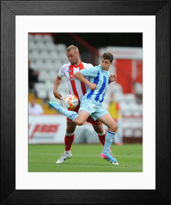 Framed Print : Battle for the Ball: A Tight Tussle between Harry Worley and Shaun Miller in Coventry City's Pre-Season Clash against Stevenage Framed Print : Battle for the Ball: A Tight Tussle between Harry Worley and Shaun Miller in Coventry City's Pre-Season Clash against Stevenage