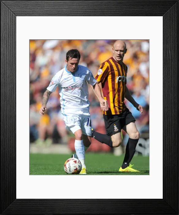 Framed Print : Danny Swanson vs Bradford City: Intense Face-Off in Sky Bet League One Clash at Valley Parade Stadium Framed Print : Danny Swanson vs Bradford City: Intense Face-Off in Sky Bet League One Clash at Valley Parade Stadium