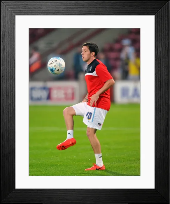 Framed Print : Danny Swanson Scores the Winning Goal for Coventry City against Scunthorpe United in Sky Bet League One at Glanford Park