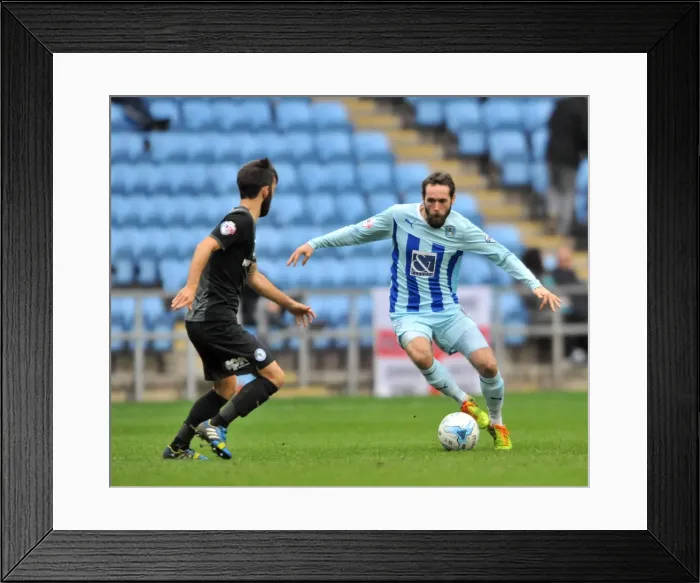 Framed Print : Clash at Ricoh Arena: Jim O'Brien vs. Jack Payne - A Battle for Supremacy in Coventry City vs. Peterborough United