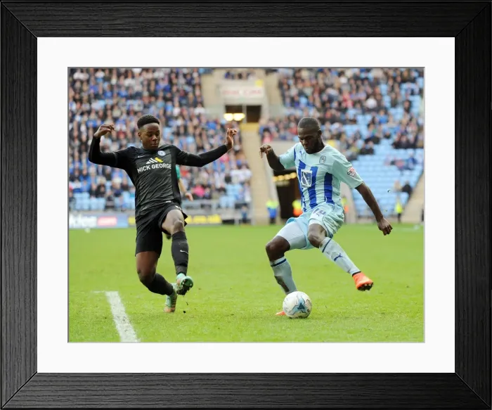 Framed Print : Intense Rivalry: Coventry City vs. Peterborough United in Sky Bet League One - A Battle for Supremacy Framed Print : Intense Rivalry: Coventry City vs. Peterborough United in Sky Bet League One - A Battle for Supremacy