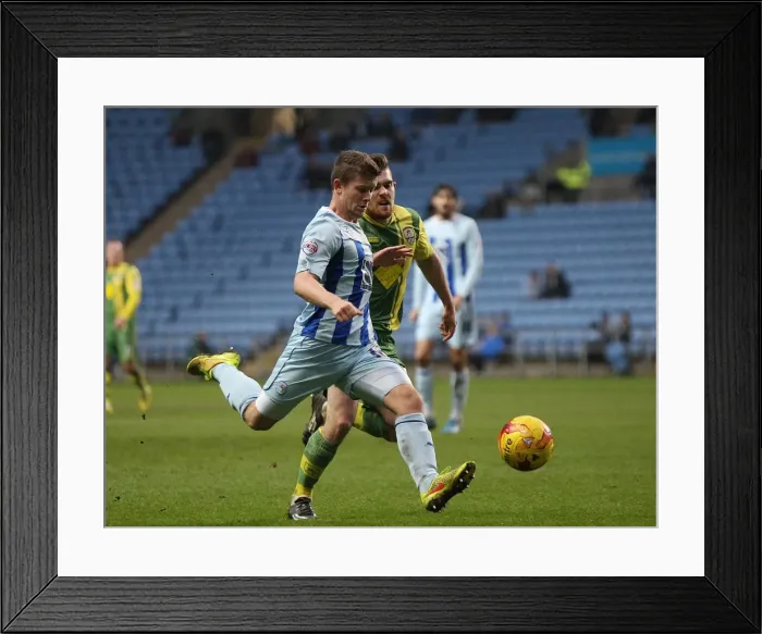 Framed Print : Clash at Ricoh Arena: Coventry City vs. Notts County in Sky Bet League One - Aaron Phillips vs. Ronan Murray