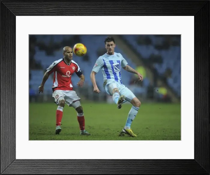 Framed Print : Intense Rivalry: Gary Madine vs. Adam Chambers in Coventry City's Sky Bet League One Clash Framed Print : Intense Rivalry: Gary Madine vs. Adam Chambers in Coventry City's Sky Bet League One Clash
