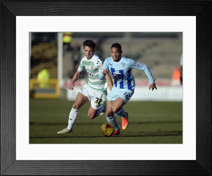 Framed Print : Thrilling Escape: Simeon Jackson Outsmarts Liam Shephard at Huish Park (Sky Bet League One) Framed Print : Thrilling Escape: Simeon Jackson Outsmarts Liam Shephard at Huish Park (Sky Bet League One)