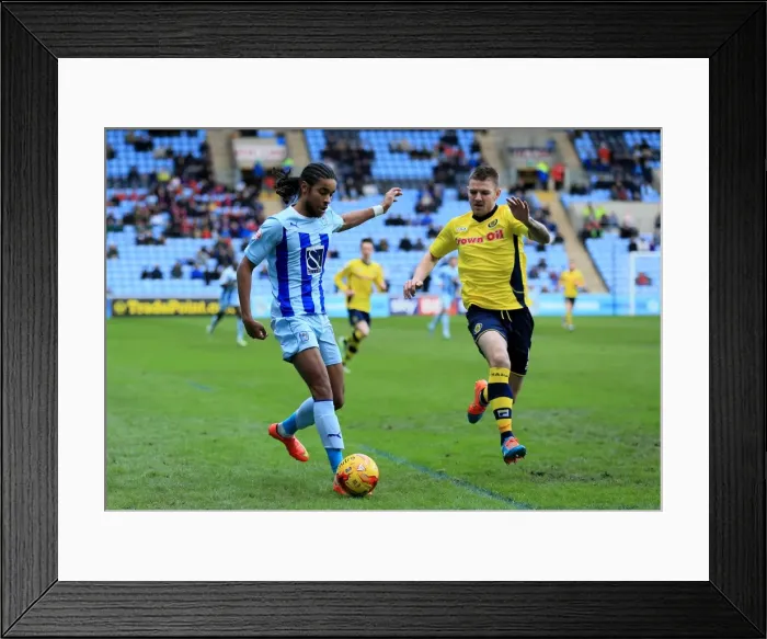 Framed Print : Intense Battle for Possession: Dominic Samuel vs Ashley Eastham in Coventry City vs Rochdale (Sky Bet League One) Framed Print : Intense Battle for Possession: Dominic Samuel vs Ashley Eastham in Coventry City vs Rochdale (Sky Bet League One)