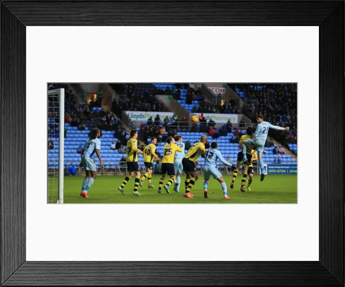 Framed Print : Aaron Martin's Thrilling Header: Coventry City vs Rochdale (Sky Bet League One) Framed Print : Aaron Martin's Thrilling Header: Coventry City vs Rochdale (Sky Bet League One)
