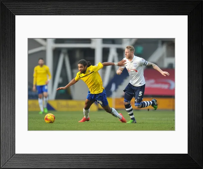 Framed Print : Intense Rivalry: Dominic Samuel vs Tom Clarke in Coventry City's Sky Bet League One Clash at Deepdale Framed Print : Intense Rivalry: Dominic Samuel vs Tom Clarke in Coventry City's Sky Bet League One Clash at Deepdale