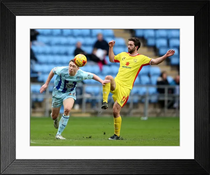 Framed Print : Intense Rivalry: Pennington vs. Grigg in Coventry City vs. Milton Keynes Dons League One Clash at Ricoh Arena Framed Print : Intense Rivalry: Pennington vs. Grigg in Coventry City vs. Milton Keynes Dons League One Clash at Ricoh Arena