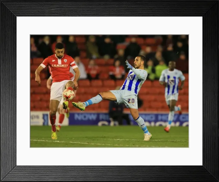 Framed Print : Intense Rivalry: Barnsley vs Coventry City - A Fight for Supremacy in Sky Bet League One: The Epic Duel of Lewin Nyatanga and Marcus Tudgay