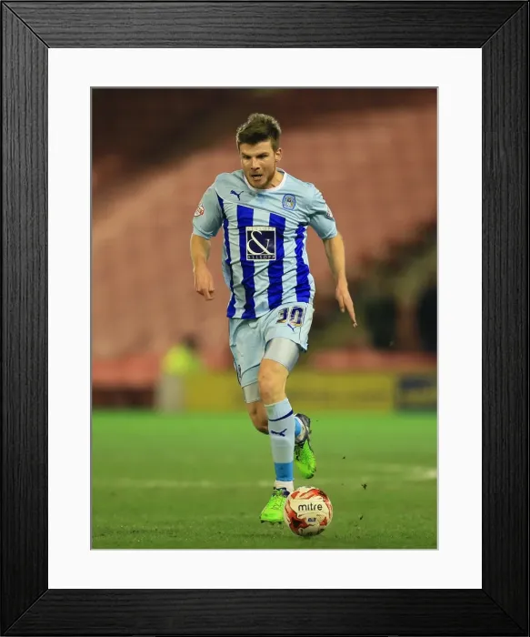 Framed Print : Chris Stokes of Coventry City Facing Off Against Barnsley in Sky Bet League One Framed Print : Chris Stokes of Coventry City Facing Off Against Barnsley in Sky Bet League One