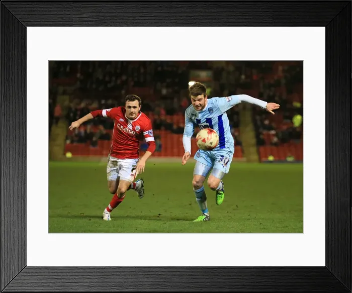 Framed Print : Intense Rivalry: A Football Battle - Scowen vs Stokes (Sky Bet League One: Barnsley vs Coventry City, Oakwell)