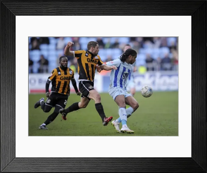 Framed Print : Intense Battle: Dominic Samuel vs Michael Brown - Coventry City's Sky Bet League One Showdown with Port Vale Framed Print : Intense Battle: Dominic Samuel vs Michael Brown - Coventry City's Sky Bet League One Showdown with Port Vale