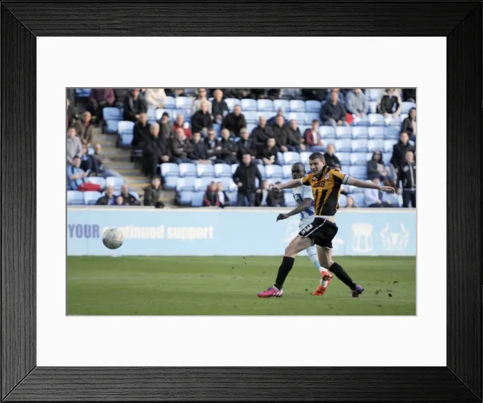 Framed Print : Sanmi Odelusi's Pressured Strike: Coventry City's Second Goal vs Port Vale (Sky Bet League One)