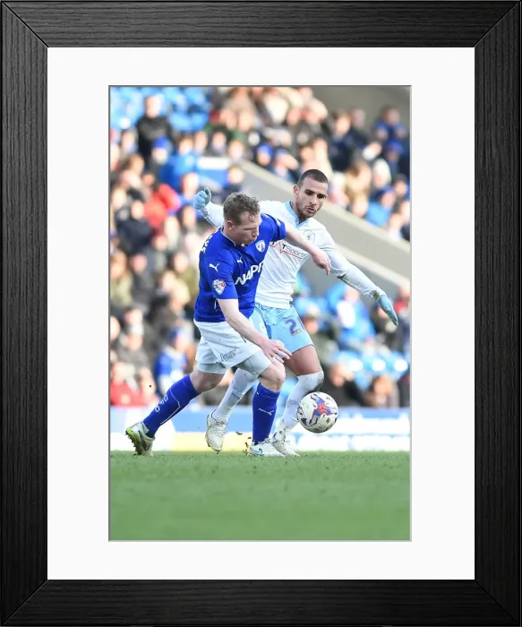 Framed Print : Battle for the Ball: Ritchie Humphries vs. Marcus Tudgay - Sky Bet League One Clash at Chesterfield's Proact Stadium Framed Print : Battle for the Ball: Ritchie Humphries vs. Marcus Tudgay - Sky Bet League One Clash at Chesterfield's Proact Stadium