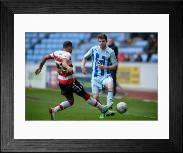 Framed Print : Intense Rivalry: Reece Wabara vs Chris Stokes Battle at Coventry City's Ricoh Arena (Sky Bet League One) Framed Print : Intense Rivalry: Reece Wabara vs Chris Stokes Battle at Coventry City's Ricoh Arena (Sky Bet League One)
