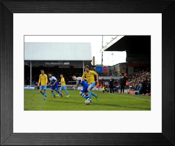 Framed Print : Intense Rivalry: A Battle for Supremacy - Chris Stokes vs Marcus Maddison (Sky Bet League One)