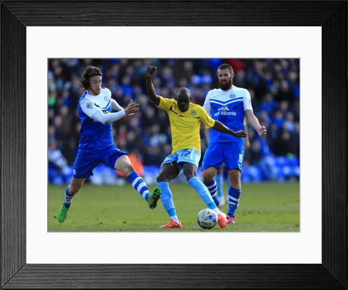 Framed Print : Sanmi Odelusi's Tight Squeeze: Coventry City vs. Peterborough United in Sky Bet League One - Coventry Forward Scores Under Pressure Framed Print : Sanmi Odelusi's Tight Squeeze: Coventry City vs. Peterborough United in Sky Bet League One - Coventry Forward Scores Under Pressure