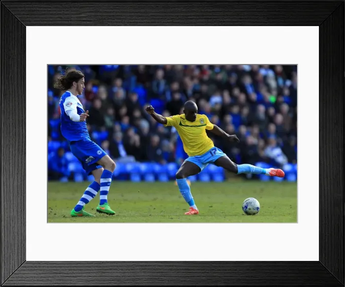 Framed Print : Sanmi Odelusi's Tight Shot Under Pressure Against Peterborough United (Sky Bet League One) Framed Print : Sanmi Odelusi's Tight Shot Under Pressure Against Peterborough United (Sky Bet League One)