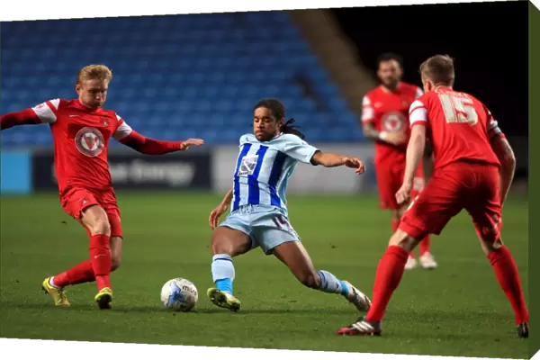Intense Rivalry: Dominic Samuel vs. Josh Wright's Battle for Ball Supremacy in Coventry City vs. Leyton Orient (Sky Bet League One)