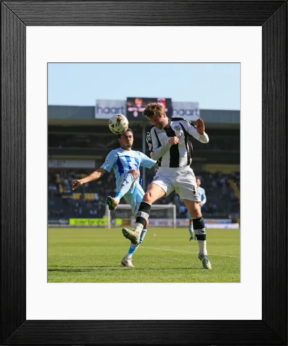 Framed Print : Battle for the Ball: McCourt vs. Ward in Sky Bet League One Clash at Meadow Lane Framed Print : Battle for the Ball: McCourt vs. Ward in Sky Bet League One Clash at Meadow Lane