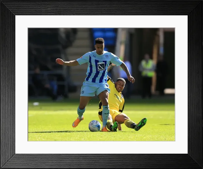 Framed Print : Battle for the Ball: Coventry City vs Colchester United in Sky Bet League One