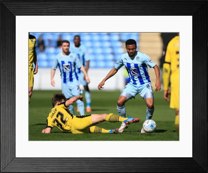 Framed Print : Battle for the Ball: Grant Ward vs Tom Lapslie - Coventry City vs Colchester United Framed Print : Battle for the Ball: Grant Ward vs Tom Lapslie - Coventry City vs Colchester United