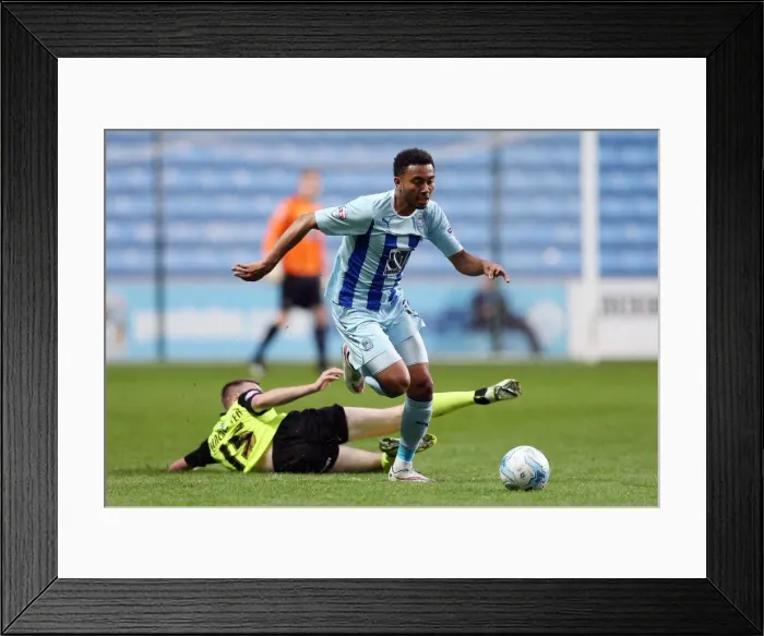 Framed Print : Grant Ward vs Carl Winchester: Intense Rivalry in Coventry City vs Oldham Athletic Sky Bet League One Clash Framed Print : Grant Ward vs Carl Winchester: Intense Rivalry in Coventry City vs Oldham Athletic Sky Bet League One Clash