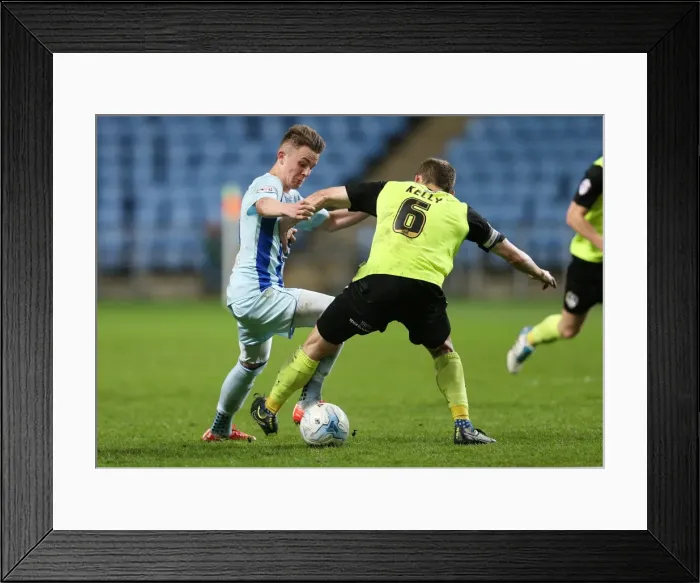 Framed Print : Clash of Midfield Maestros: James Maddison vs. Liam Kelly (Sky Bet League One) Framed Print : Clash of Midfield Maestros: James Maddison vs. Liam Kelly (Sky Bet League One)