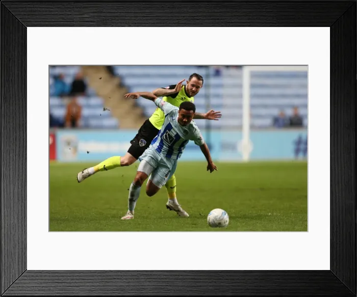 Framed Print : Showdown at Ricoh Arena: A League One Battle between Grant Ward and Rhys Murphy Framed Print : Showdown at Ricoh Arena: A League One Battle between Grant Ward and Rhys Murphy