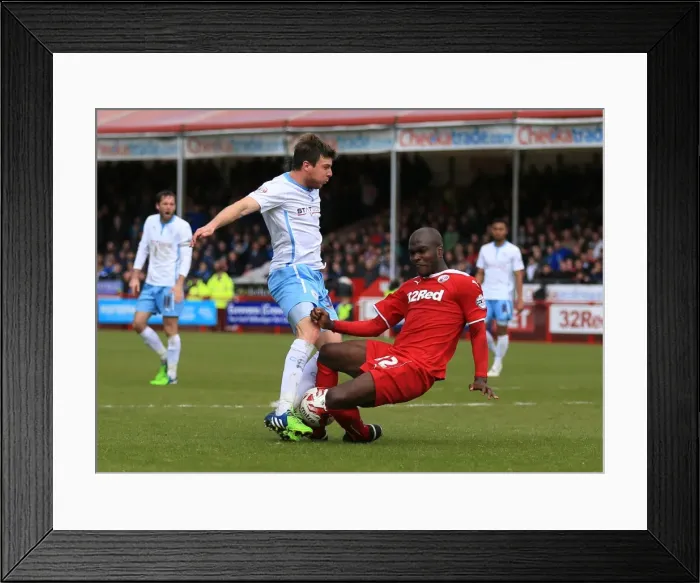 Framed Print : Intense Rivalry: Chris Stokes vs. Kelly Youga - Battle for the Ball in Sky Bet League One Framed Print : Intense Rivalry: Chris Stokes vs. Kelly Youga - Battle for the Ball in Sky Bet League One