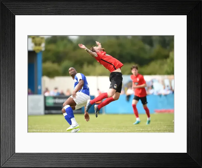 Framed Print : Clash of the Titans: Marlon Harwood vs. Romain Vincelot - Nuneaton Town vs. Coventry City Pre-Season Friendly Framed Print : Clash of the Titans: Marlon Harwood vs. Romain Vincelot - Nuneaton Town vs. Coventry City Pre-Season Friendly