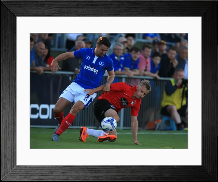 Framed Print : Enda Stevens vs George Thomas: A Battle for Possession in Portsmouth vs Coventry City Pre-Season Friendly