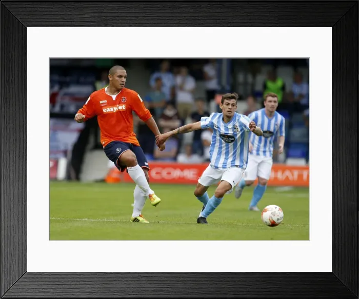 Framed Print : Clash of the Midfield Maestros: Nathan Doyle vs. Ruben Lameiras at Kenilworth Road Framed Print : Clash of the Midfield Maestros: Nathan Doyle vs. Ruben Lameiras at Kenilworth Road