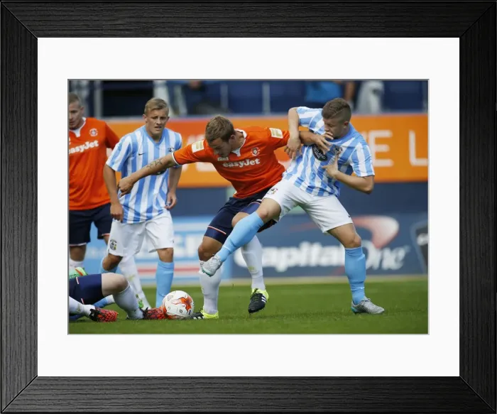 Framed Print : Clash of Titans: Luke Wilkinson vs. Aaron Phillips in Coventry City's Pre-Season Friendly at Luton Town Framed Print : Clash of Titans: Luke Wilkinson vs. Aaron Phillips in Coventry City's Pre-Season Friendly at Luton Town