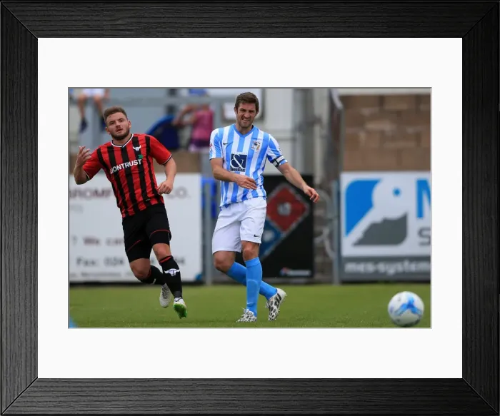 Framed Print : Sam Ricketts vs Alex McDonald: A Pre-Season Rivalry at Liberty Way Stadium - Coventry City vs Oxford United Framed Print : Sam Ricketts vs Alex McDonald: A Pre-Season Rivalry at Liberty Way Stadium - Coventry City vs Oxford United