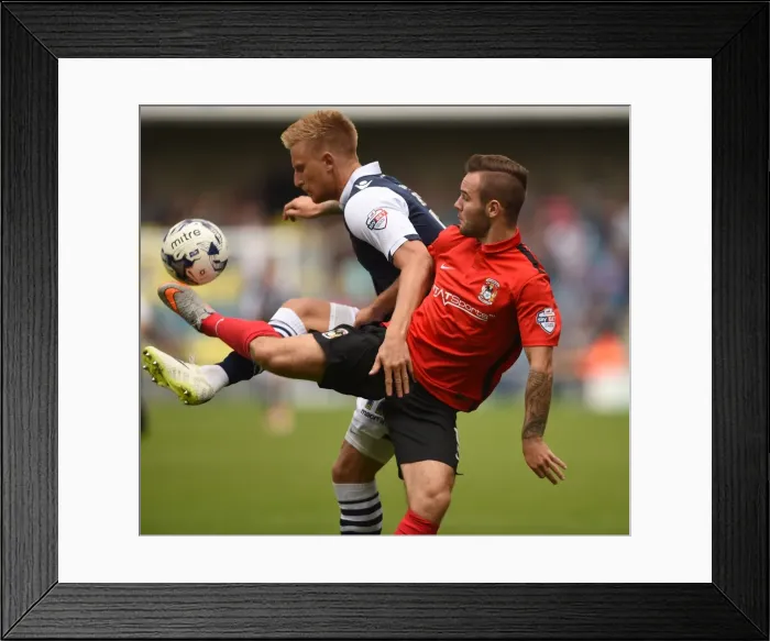 Framed Print : Battle for the Ball: Webster vs. Armstrong in Millwall vs. Coventry City (Sky Bet League One) Framed Print : Battle for the Ball: Webster vs. Armstrong in Millwall vs. Coventry City (Sky Bet League One)