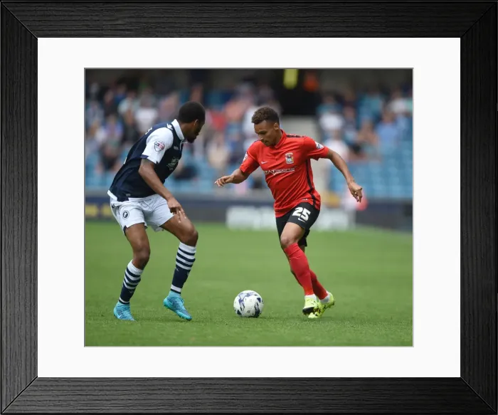 Framed Print : Showdown at The New Den: Cummings vs. Murphy - Sky Bet League One Battle between Millwall and Coventry City
