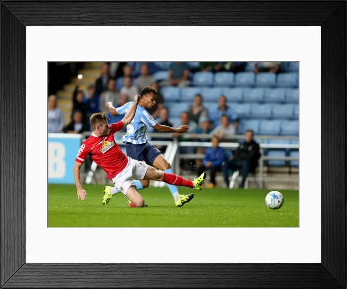 Framed Print : Jacob Murphy's Shot vs. Oliver Turton's Tackle: A Sky Bet League One Moment at Coventry City's Ricoh Arena Framed Print : Jacob Murphy's Shot vs. Oliver Turton's Tackle: A Sky Bet League One Moment at Coventry City's Ricoh Arena