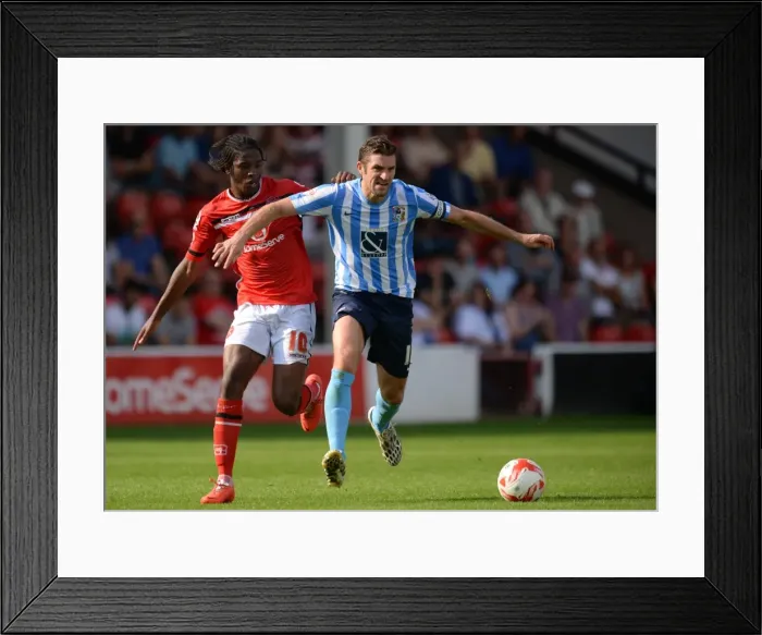 Framed Print : Intense Rivalry: Sam Ricketts vs. Romaine Sawyers Clash in Coventry City's Sky Bet League One Match at Walsall Framed Print : Intense Rivalry: Sam Ricketts vs. Romaine Sawyers Clash in Coventry City's Sky Bet League One Match at Walsall