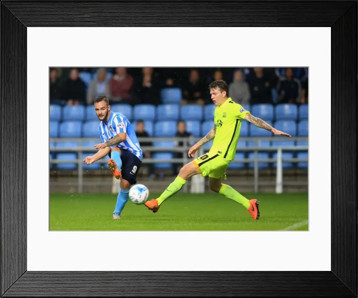 Framed Print : Battle for the Ball: Coventry City's Armstrong vs. Southend's Rea