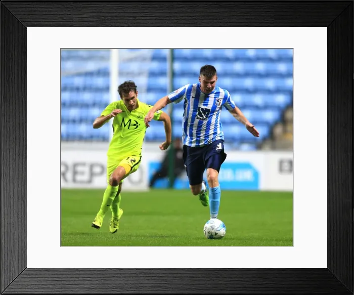Framed Print : Intense Rivalry: Stokes vs. Atkinson - Coventry City vs. Southend United Framed Print : Intense Rivalry: Stokes vs. Atkinson - Coventry City vs. Southend United