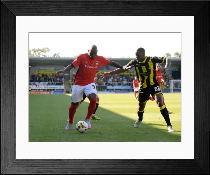 Framed Print : Intense Battle: Binnom-Williams vs. Fortune - Sky Bet League One Tackle Showdown between Burton Albion and Coventry City Framed Print : Intense Battle: Binnom-Williams vs. Fortune - Sky Bet League One Tackle Showdown between Burton Albion and Coventry City
