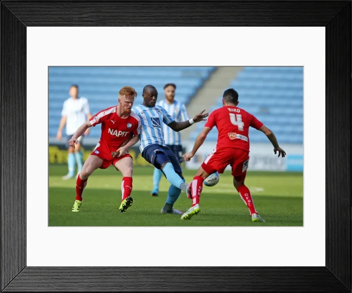 Framed Print : Marc-Antoine Fortune Battles Past Chesterfield Defenders in Coventry City's Sky Bet League One Match Framed Print : Marc-Antoine Fortune Battles Past Chesterfield Defenders in Coventry City's Sky Bet League One Match