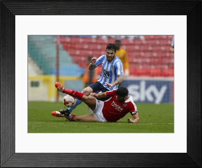 Framed Print : Battle for the Ball: Kasim vs. Vincelot - Swindon Town vs. Coventry City (Sky Bet League One) Framed Print : Battle for the Ball: Kasim vs. Vincelot - Swindon Town vs. Coventry City (Sky Bet League One)