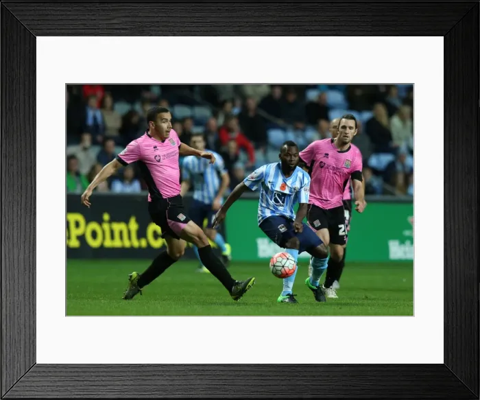 Framed Print : Battle for the Ball: Coventry City vs Northampton Town - Emirates FA Cup First Round Framed Print : Battle for the Ball: Coventry City vs Northampton Town - Emirates FA Cup First Round