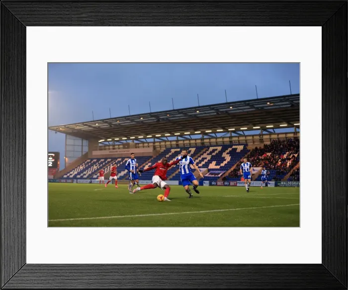 Framed Print : Marc Antoine-Fortune's Determined Shot: Coventry City vs Colchester United in Sky Bet League One