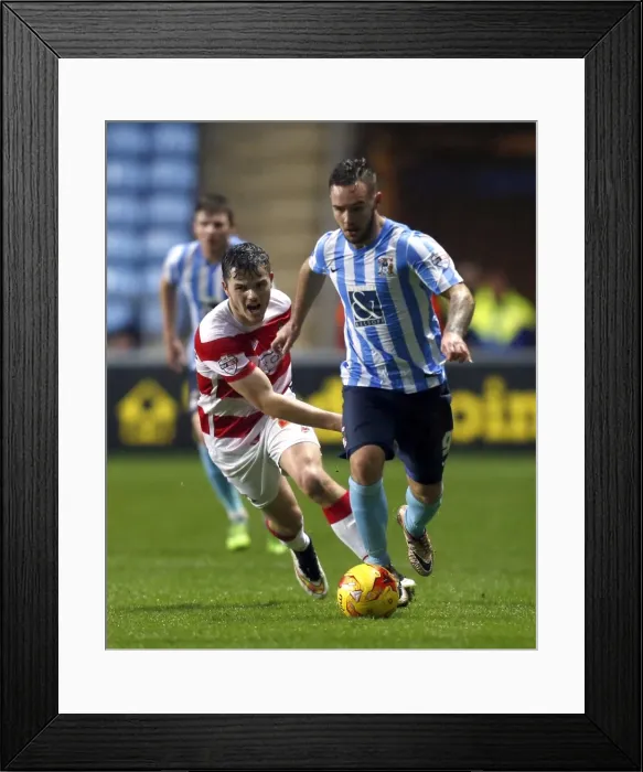 Framed Print : Sky Bet League One Showdown at RICOH Arena: Coventry City vs Doncaster Rovers - A Clash Between Adam Armstrong and Harry Middleton