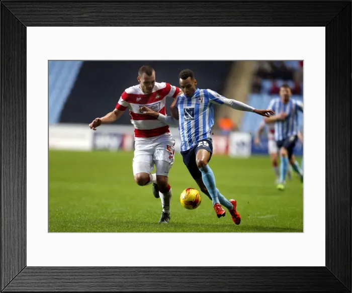 Framed Print : Intense Rivalry: Jacob Murphy vs. Luke McCullough in Coventry City's Sky Bet League One Clash against Doncaster Rovers Framed Print : Intense Rivalry: Jacob Murphy vs. Luke McCullough in Coventry City's Sky Bet League One Clash against Doncaster Rovers