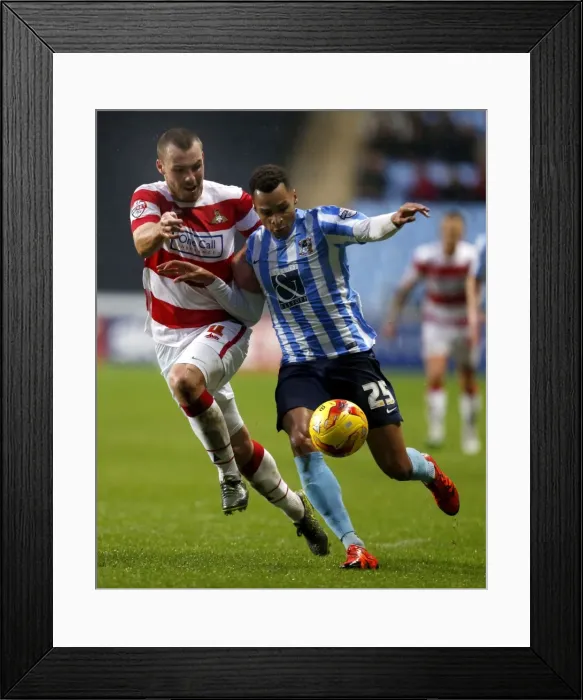 Framed Print : Intense Rivalry: Jacob Murphy vs Luke McCullough in Coventry City's Sky Bet League One Clash against Doncaster Rovers